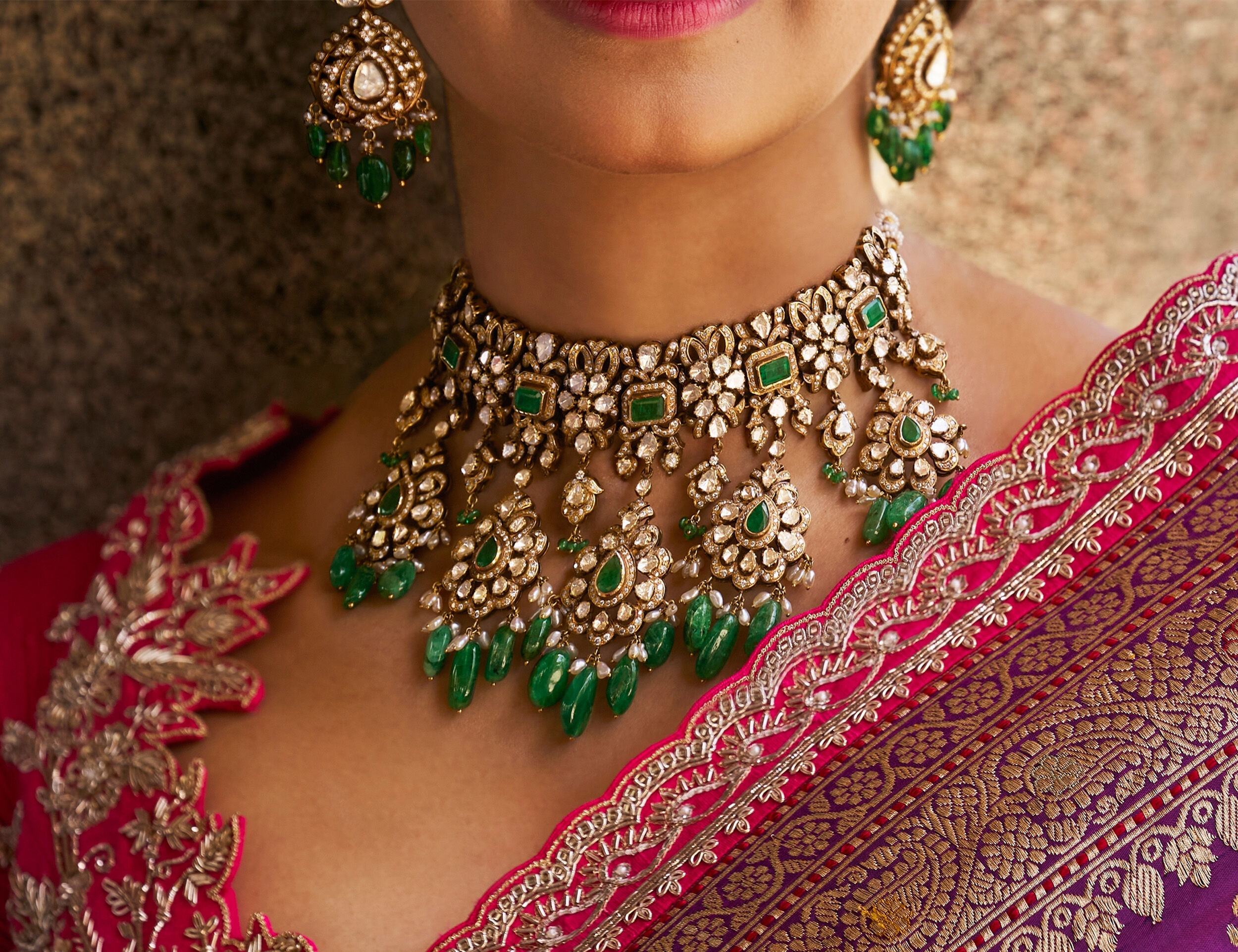 Bride flaunting gold bangles paired with kundan jewellery